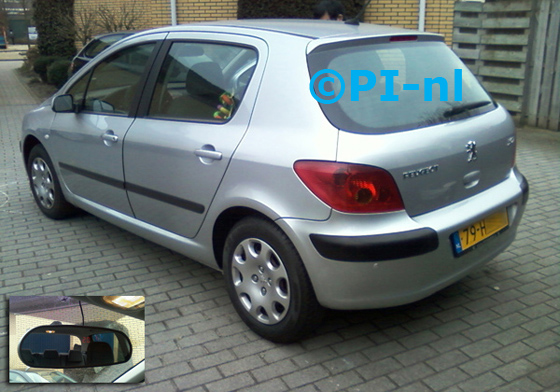 Peugeot 307 uit 2001. De display (set C) is het 'spiegelmodel'.