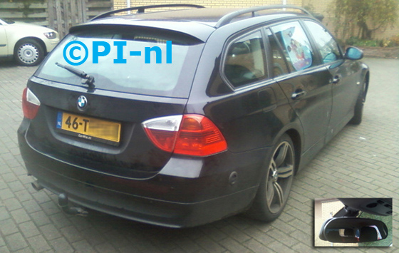 BMW 318i Touring uit 2006. De display (set C) is het 'spiegelmodel'.