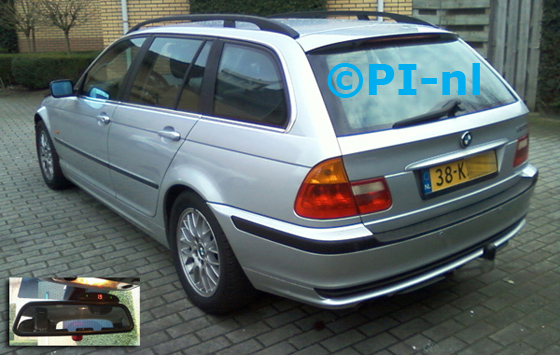 BMW 320i Touring uit 2000. De display (set A) werd bovenop de binnenspiegel gemonteerd.