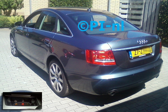 Audi A6 uit 2008. De display (set A 2013) werd in de asbak geplaatst.