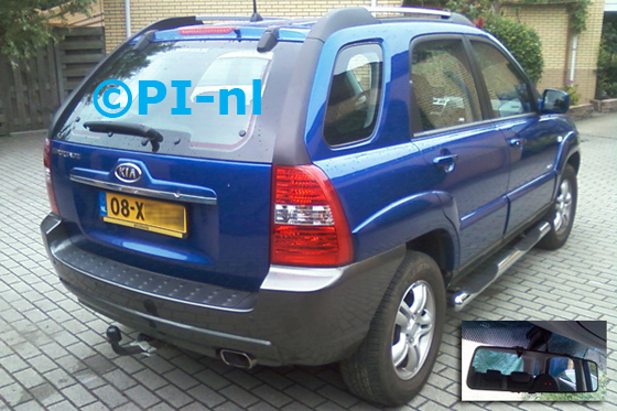 Kia Sportage uit 2007. De display (set C 2013) is het 'spiegelmodel'.