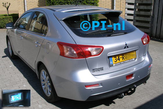 Parkeersensoren ingebouwd door PI-nl in een Mitsubishi Lancer Sportbreak 1.6 First Edition uit 2011. De display (set B 2015) werd in de middenconsole gemonteerd.