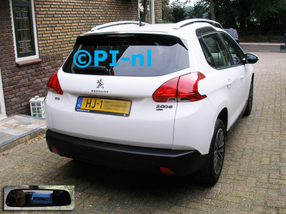 Parkeersensoren ingebouwd door PI-nl in een Peugeot 2008 uit 2015 met canbus. De spiegeldisplay (set D 2016) is van de set met camera en sensoren.