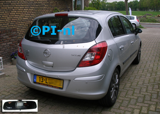 Parkeersensoren ingebouwd door PI-nl in een Opel Corsa 1.4 16V uit 2010. De spiegeldisplay (set D 2017) is van de set met camera en sensoren.