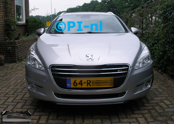 Peugeot 407 SW 1.6 XT uit 2005. De display (set A 2011) werd verstopt.