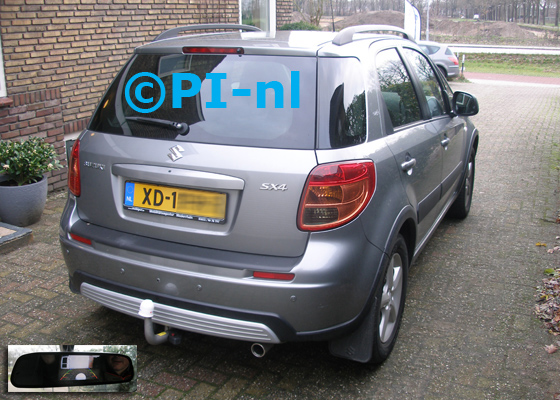 Parkeersensoren (set D 2018) ingebouwd door PI-nl in een Suzuki SX4 uit 2009. De spiegeldisplay is van de set met bumpercamera en sensoren.