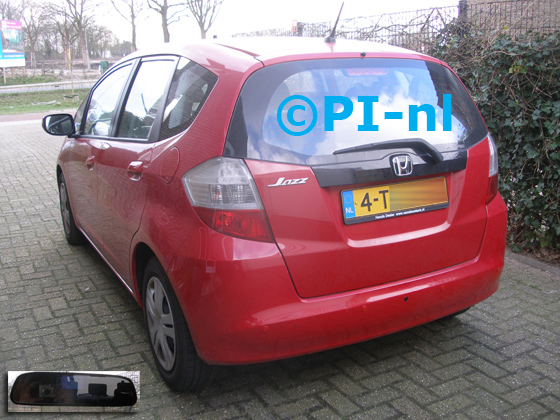 Parkeersensoren (set D 2020) ingebouwd door PI-nl in een Honda Jazz uit 2010. De spiegeldisplay is van de set met bumpercamera en sensoren.