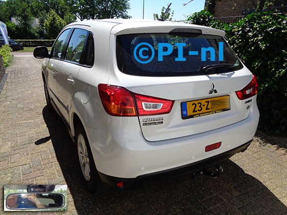 Parkeersensoren (set A 2022) ingebouwd door PI-nl in een Mitsubishi ASX uit 2013. De display werd op de binnenspiegel gemonteerd. Er werden standaard witte sensoren gemonteerd.