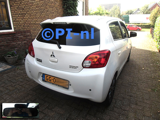 Parkeersensoren (set A 2023) ingebouwd door PI-nl in een Mitsubishi SpaceStar uit 2015. De display werd bovenop de binnenspiegel gemonteerd.