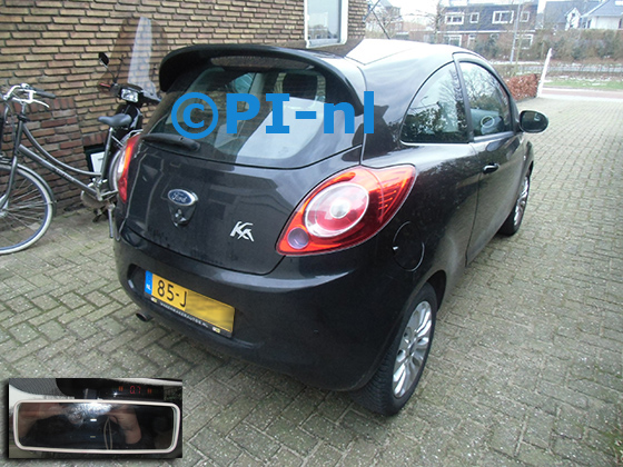 Parkeersensoren (set A 2024) ingebouwd door PI-nl in een Ford Ka uit 2009. De display werd op de binnenspiegel gemonteerd.