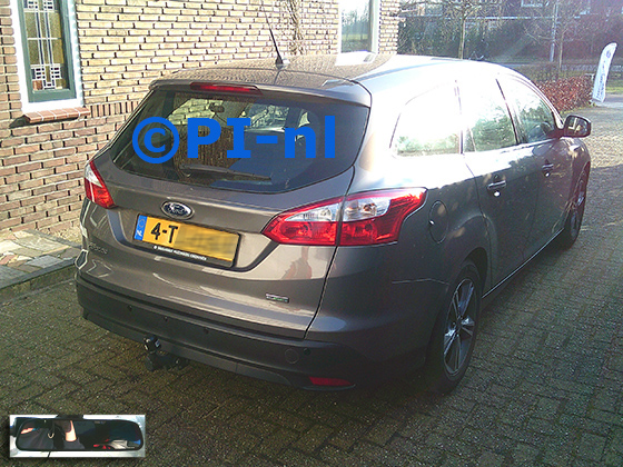 Parkeersensoren (set D 2025) ingebouwd door PI-nl in een Ford Focus Ecoboost Wagon met canbus uit 2014. De spiegeldisplay is van de set met bumpercamera en sensoren.