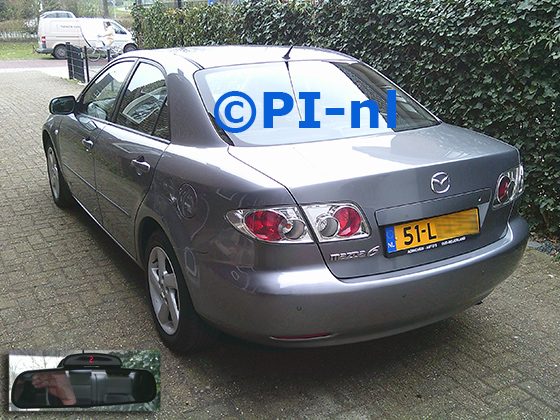 Parkeersensoren (set H 2025) ingebouwd door PI-nl in een Mazda 6 Touring sedan uit 2003. De display werd op de binnenspiegel gemonteerd.