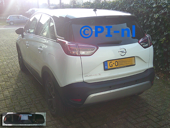 Parkeersensoren (set D 2026) ingebouwd door PI-nl in een Opel Crossland X 2019. De spiegeldisplay is van de set met bumpercamera en sensoren.